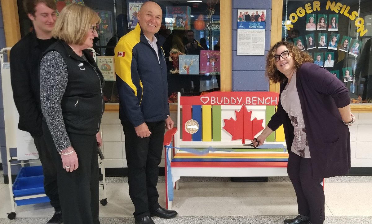 A new Buddy Bench was unveiled at Roger Neilson Public School. Taking part were, from left, Nate Loch; Rotarian Donna Geary; Kawartha Club President Brian Prentice and school principal Denise Humphries.