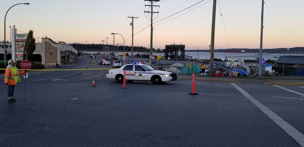 Police have evacuated a portion of the Nanaimo tent city after possible bomb-making components were found. 