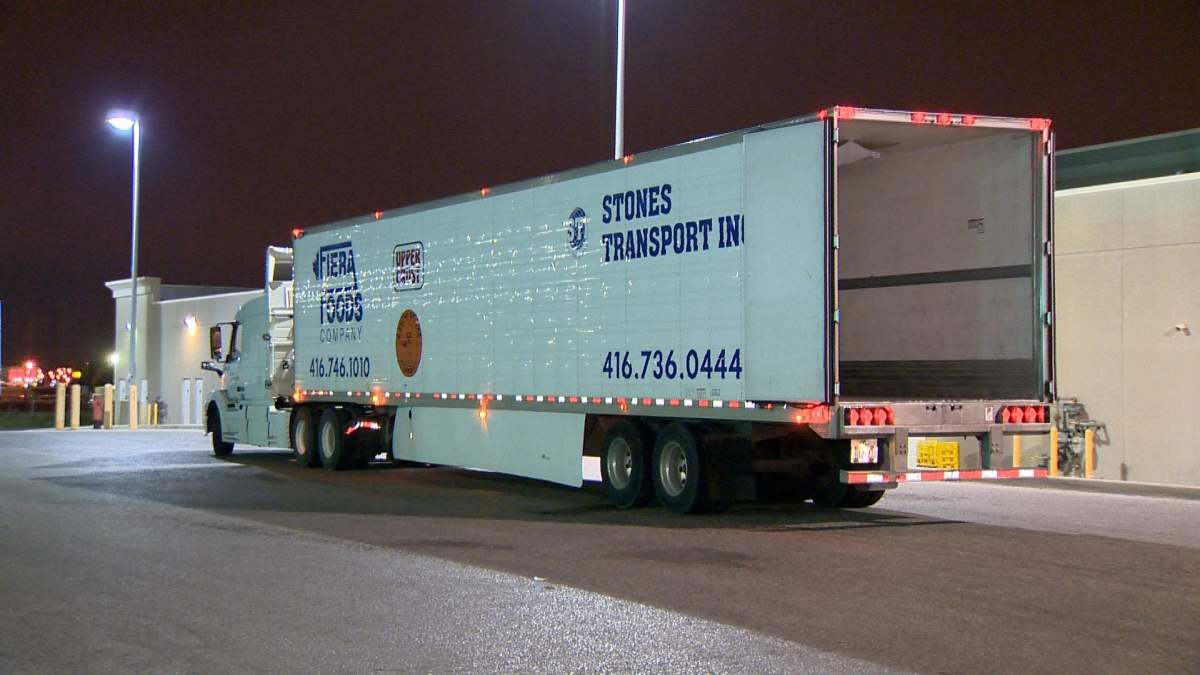 A man is dead after he was struck by a tractor-trailer in the loading dock area of a bakery in Toronto on Oct. 25, 2018.
