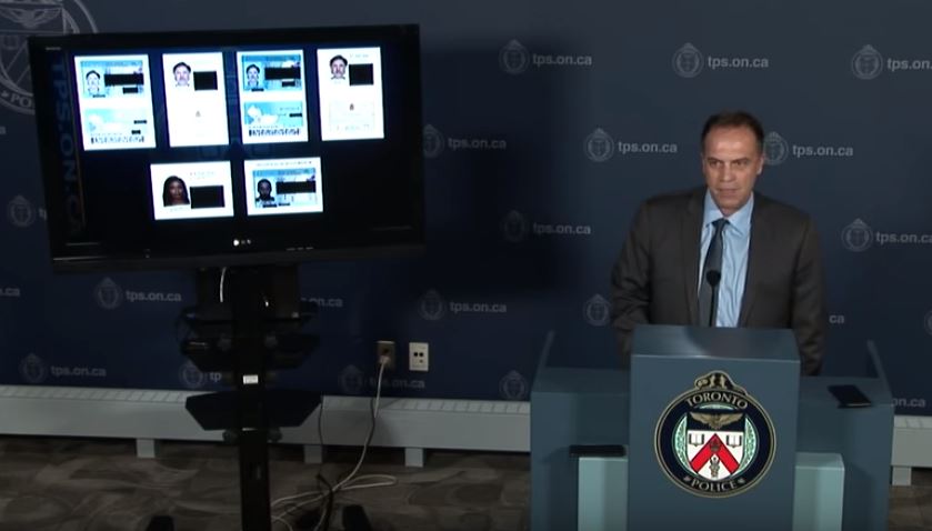 Toronto Police Det. Sgt. Ian Nichol says a 32-year-old man is facing numerous charges in connection with two alleged schemes.