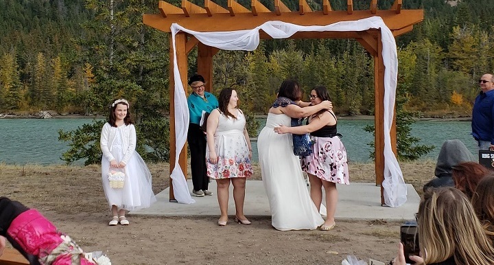 Flower girl Renee Morin (left) had her dream come true when bride Bev Lesburg heard on CISN Country 103.9 that the eight-year-old was hoping to find someone she could be a flower girl for. 