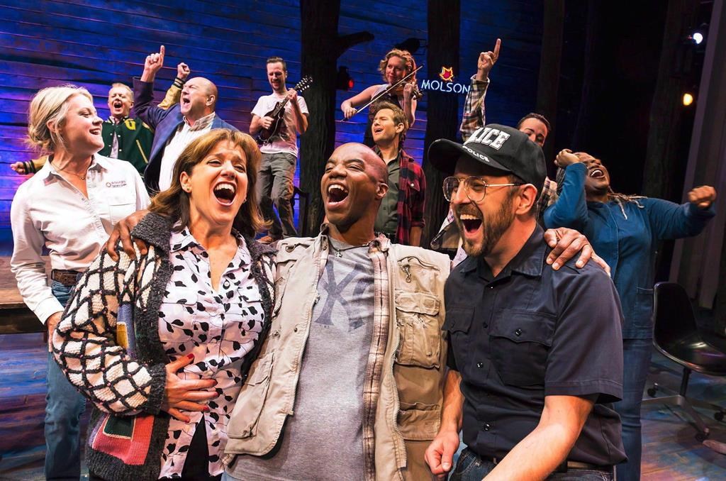 The cast of "Come From Away," are shown in a 2016 handout photo. The hit Canadian musical that was inspired by the kindness of several small Newfoundland communities is returning the favour.