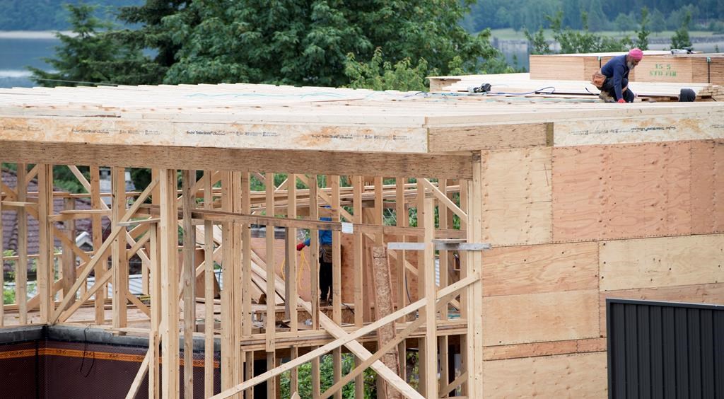 A new home is under construction in North Vancouver, B.C., Tuesday, June 12, 2018. The annual pace of Canadian housing starts in September slowed compared with August. THE CANADIAN PRESS Jonathan Hayward.