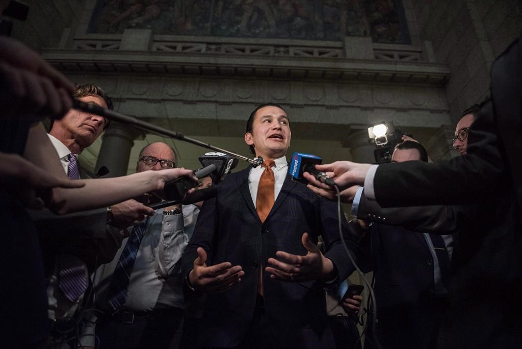 Leader of the Opposition in the Manitoba Legislative Assembly, Wab Kinew scrums at the Manitoba Legislature in Winnipeg on March 12, 2018.