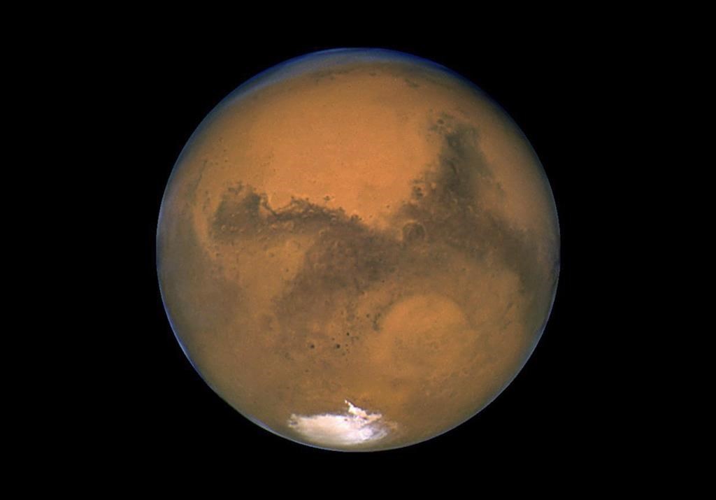 This Aug. 26, 2003 image made available by NASA shows Mars photographed by the Hubble Space Telescope on the planet's closest approach to Earth in 60,000 years.