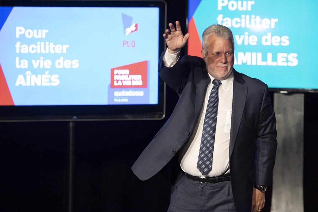 Quebec Liberal Leader Philippe Couillard waves to supporters after he lost the general election to a majority CAQ government, Monday, October 1, 2018 in Saint-Felicien, Quebec.