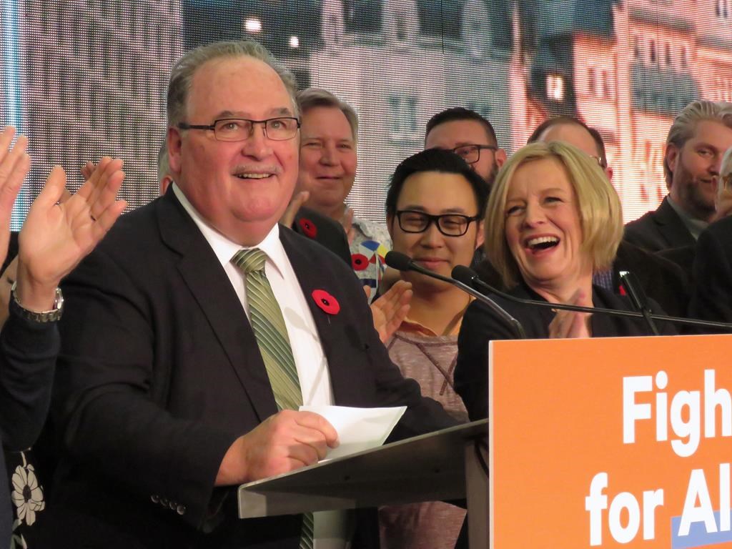 Alberta Government House Leader Brian Mason, with Premier Rachel Notley at his side, makes his farewell address Saturday to party members at the annual provincial NDP convention on Edmonton on Saturday Oct. 27, 2018.