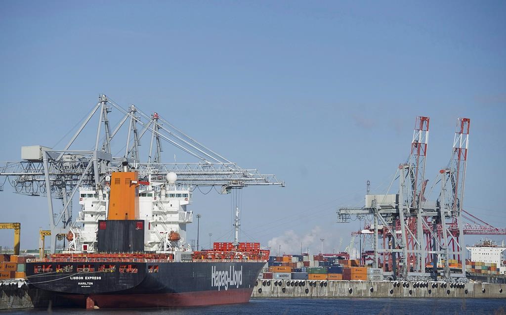 Container ships are shown in the Port of Montreal.