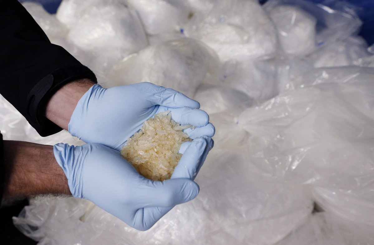 File: A criminal expert shows Crystal  meth at the German federal police in Wiesbaden, Germany.