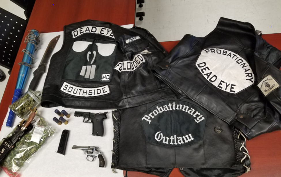 Brockville police have released this image showing items that were allegedly seized after officers executed a search warrant at a Brockville residence. Police say they arrested two people involved in the biker gang Dead Eyes MC.