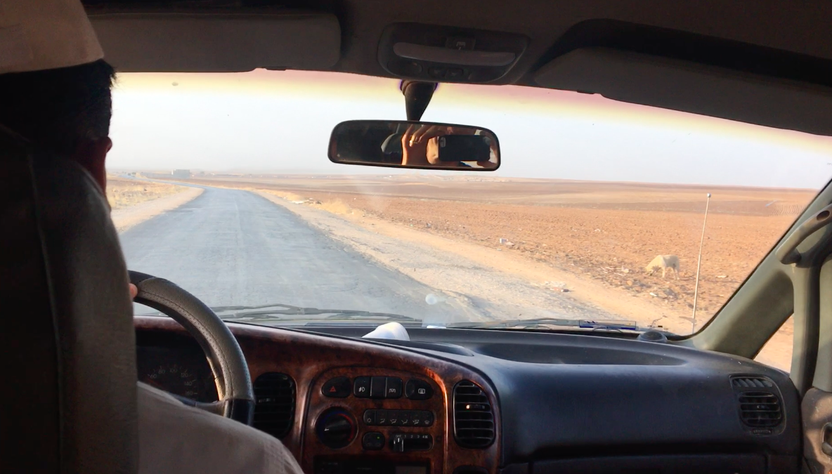 Driving across the empty landscape of northeastern Syria.
