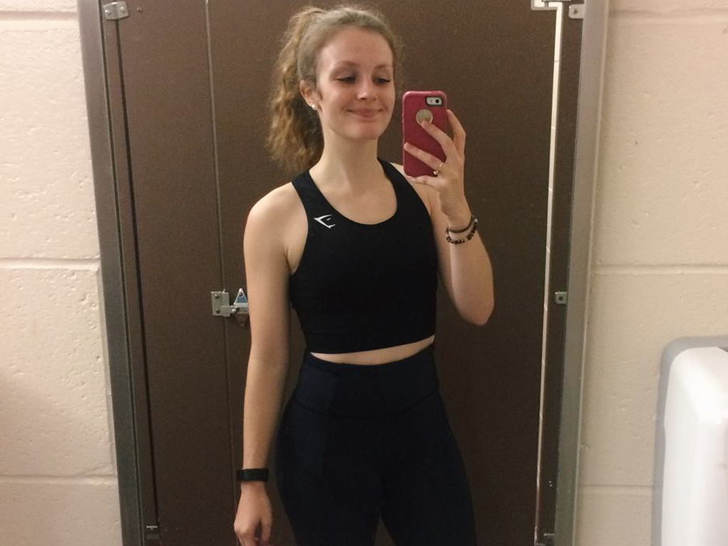 University student Kylee Graham in the outfit she said she was wearing when campus gym staff questioned her top. 
