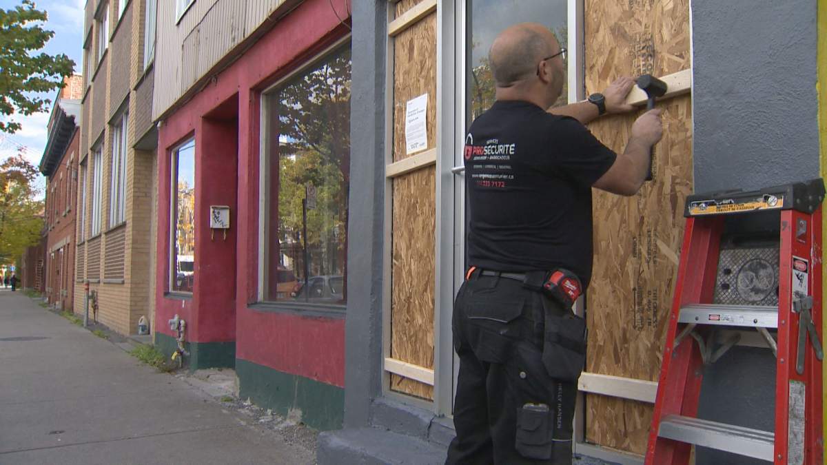 The city of Montreal boarded up two buildings in Point St-Charles on Wednesday.