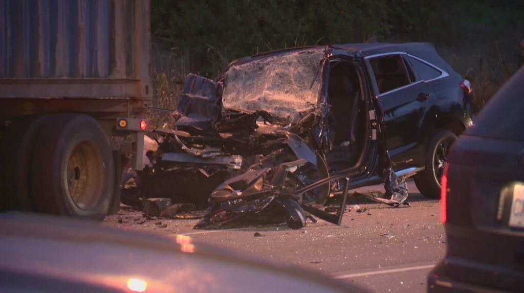 A collision between an SUV and a semi truck in Surrey on Friday has left one man dead. 