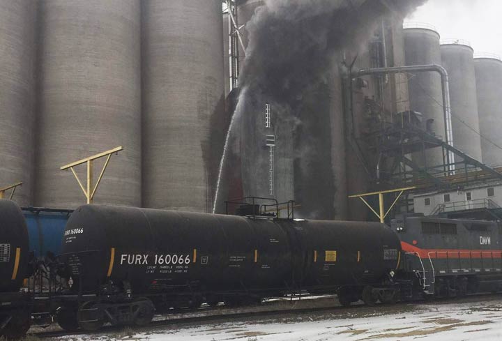 Firefighters battled a blaze at the grain elevator east of Unity, Sask., on Oct. 11.