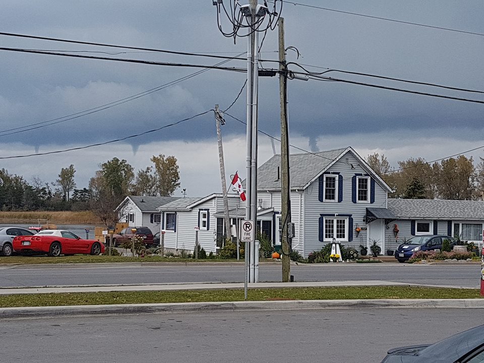 Funnel clouds and water spouts were spotted hanging around Prince Edward County on Tuesday.