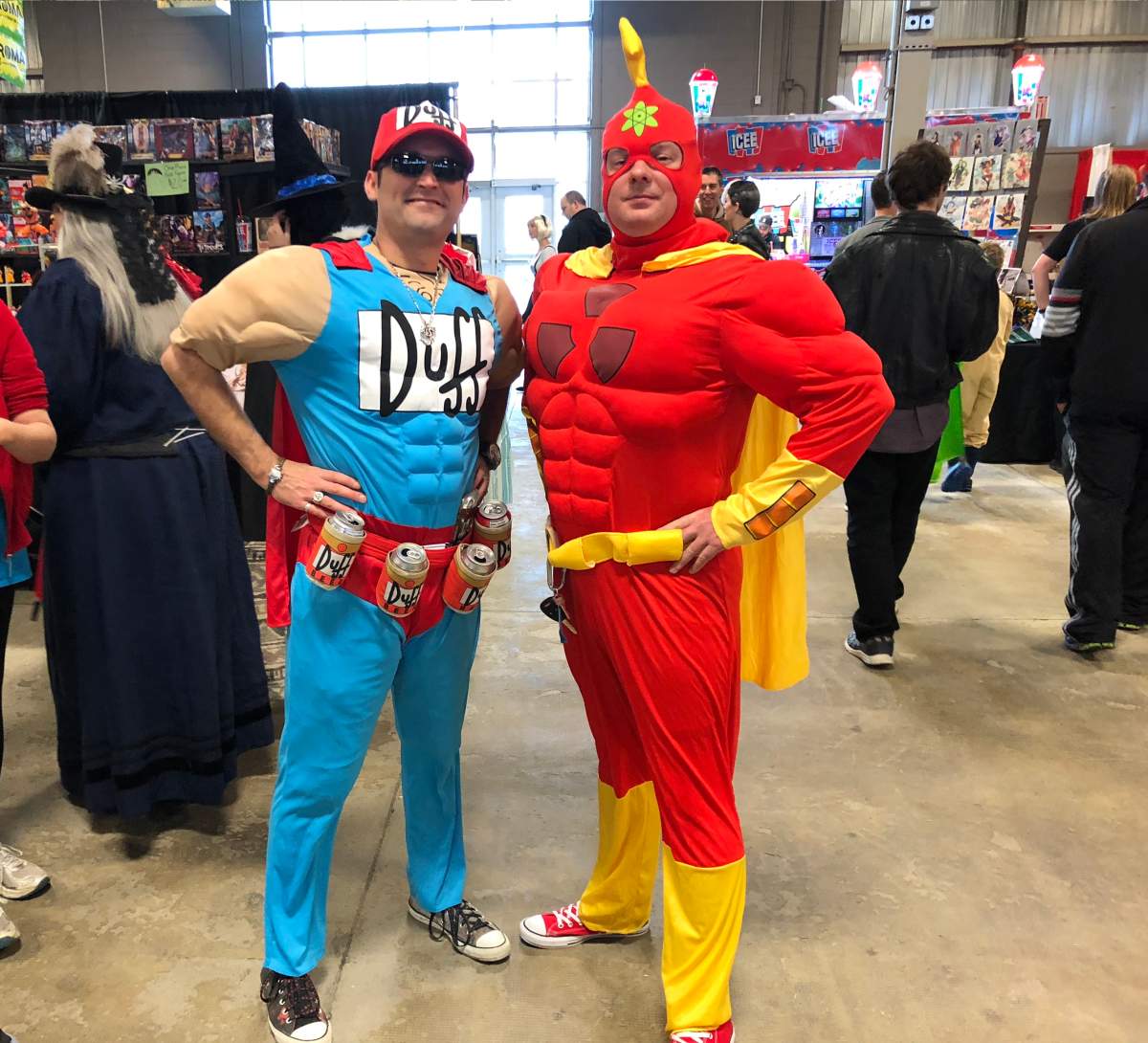 James Flonders (left) poses alongside Todd Reid. The pair are dressed up as Duff-Man and Radioactive Man from the Simpsons, respectively.