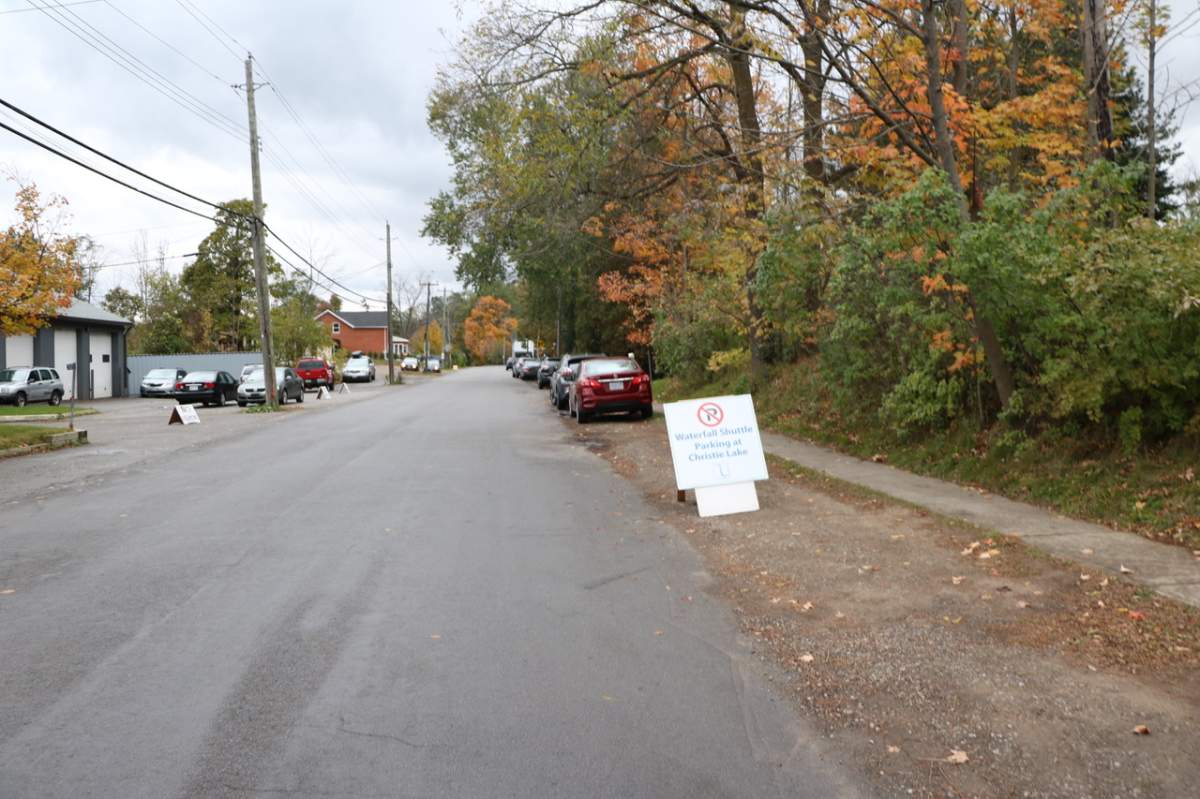 A sign for the shuttle service to Tews and Webster’s falls.