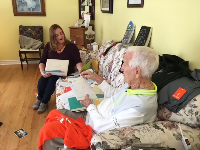 Gerard Dunn and his daughter Miriam open mail together.