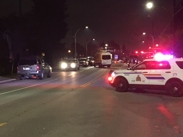 Police at the scene of a standoff in Burnaby on Thursday night. 