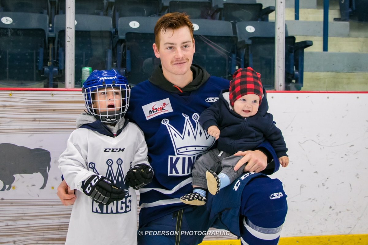 Riley Shamray (middle) poses with his billet brothers Bennett and Lawson. 
