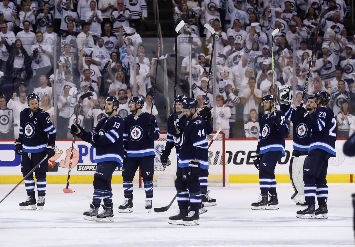The Winnipeg Jets salute the crowd after falling to the Vegas Golden Knights during the Western Conference Finals, game 5, in Winnipeg, Sunday, May 20, 2018. 