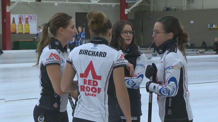 Members of Team Einarson talk during a game at the Mother Club Fall Curling Classic at the Granite Curling Club.