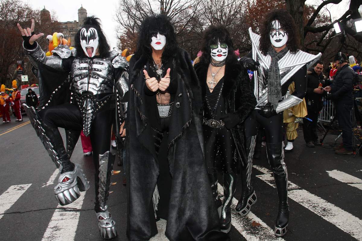 (L-R) Gene Simmons, Paul Stanley, Eric Singer and Tommy Thayer of KISS attend 88th Annual Macy’s Thanksgiving Day Parade on Nov. 27, 2014 in New York City.