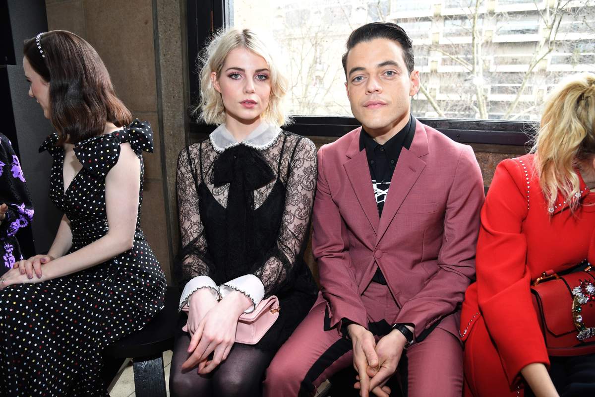Rami Malek and Lucy Boynton attend the Miu Miu show as part of the Paris Fashion Week on March 6, 2018 in Paris, France.