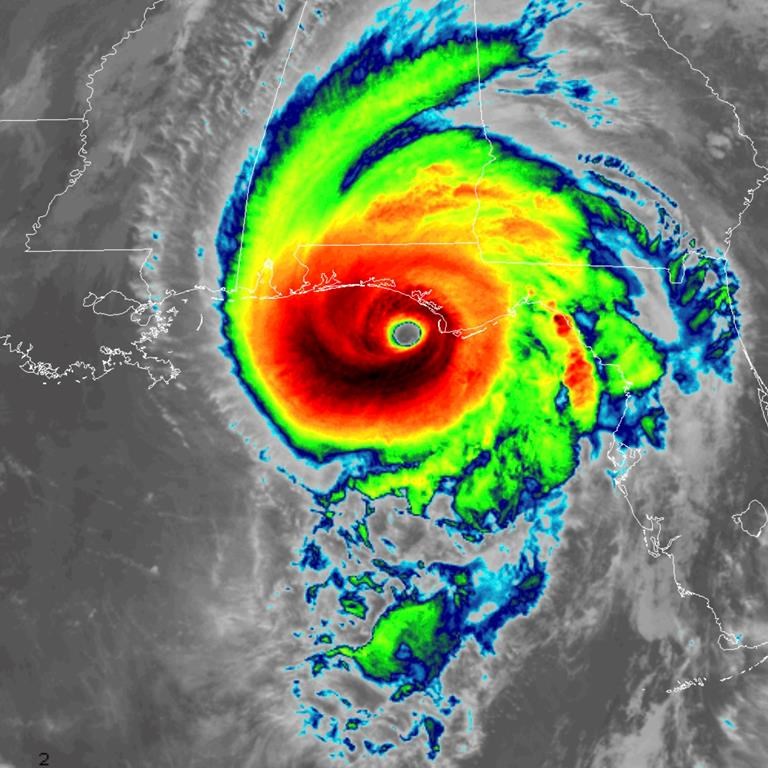 This infrared satellite image made available by NOAA shows Hurricane Michael approaching the Florida panhandle on Wednesday, Oct. 10, 2018 at 11:40 a.m. EDT.