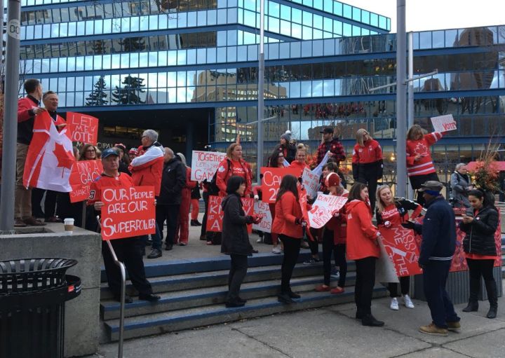 Calgary 2026 Olympic bid supporters rally outside Calgary City Hall on Wednesday, Oct. 31. 