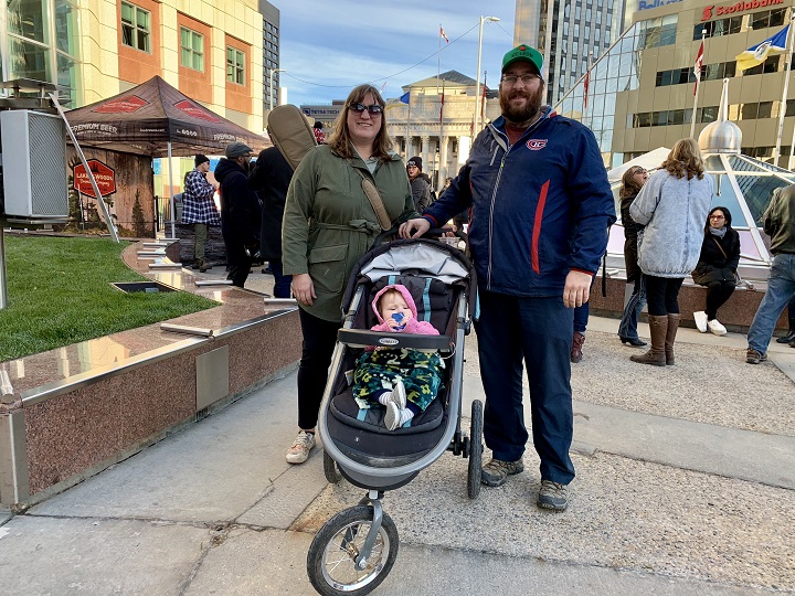 Jenny and Marc Foidart attend Open Fest with their 10-month-old girl at Portage and Main.