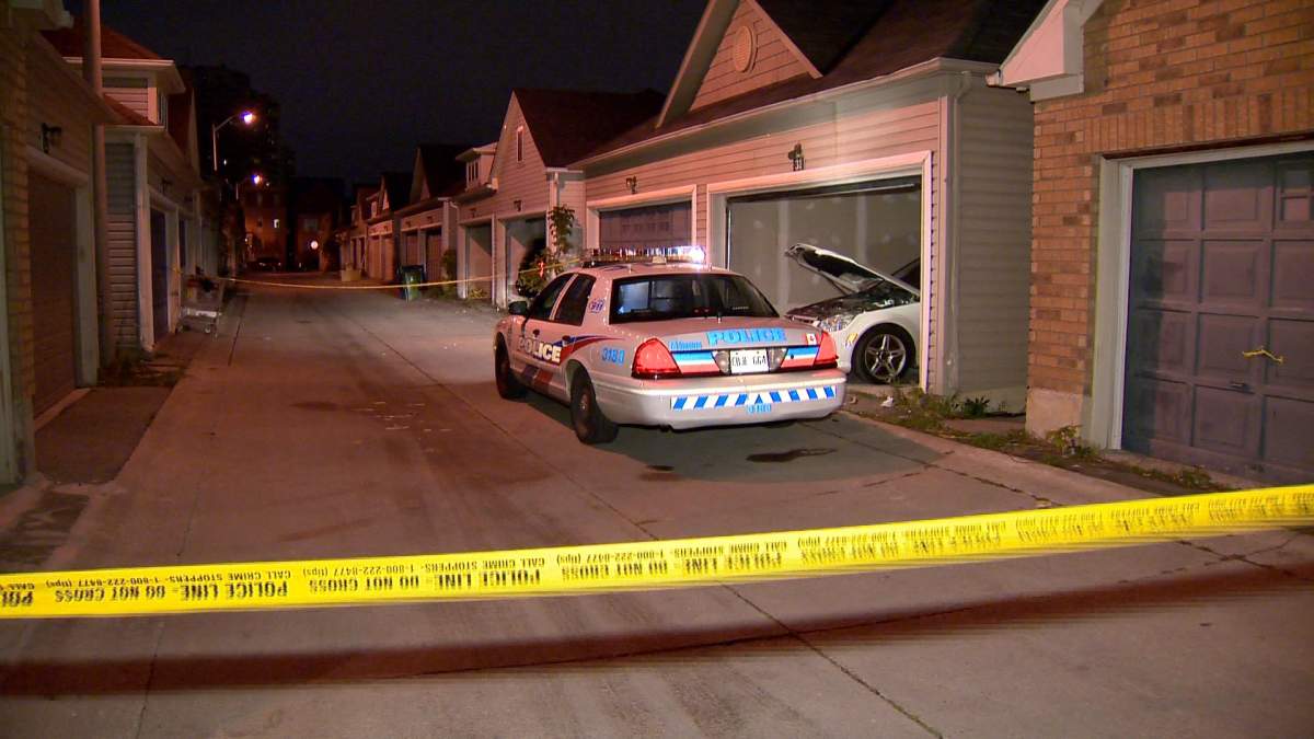 A man was seriously injured after being pinned under a car at a residential garage in north Toronto on Oct. 26, 2018.