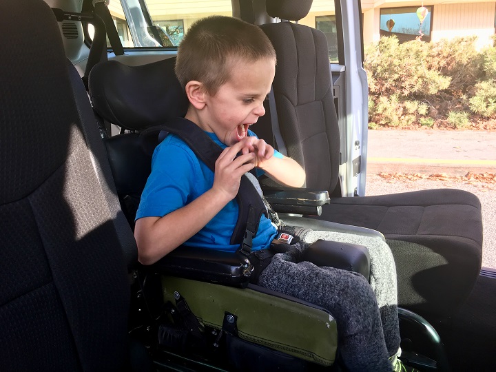 Remington inside his mom’s new Sunshine Family Van.