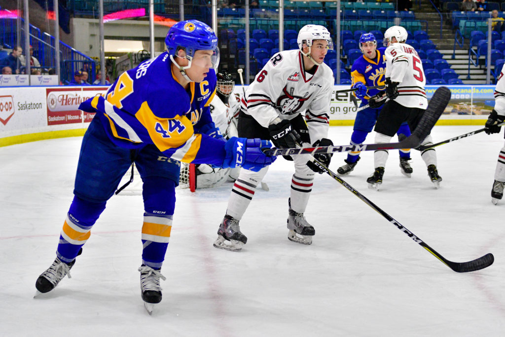 Saskatoon Blades scored in overtime for a 3-2 home win over the Red Deer Rebels Saturday night.