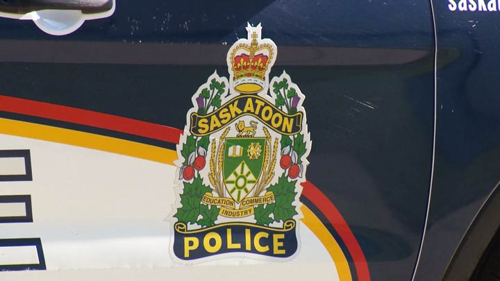 Saskatoon police say a woman woke up to an unknown man who then undressed and touched himself.