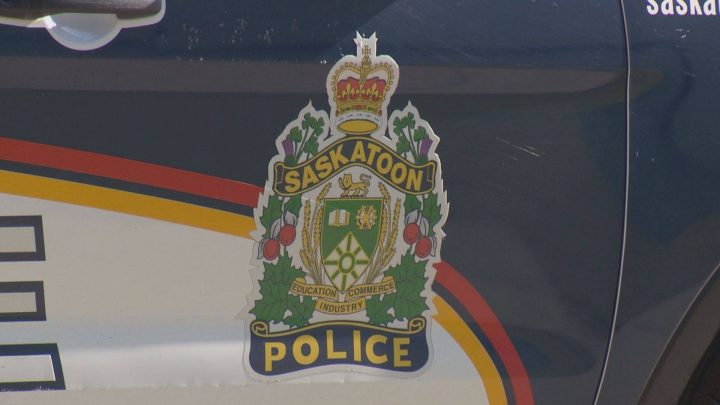 A photo of the Saskatoon police shield on the side of a patrol vehicle.