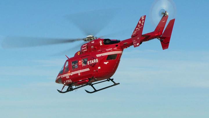 A mountain biker found near Bragg Creek was flown to hospital after suffering serious injuries on Saturday.