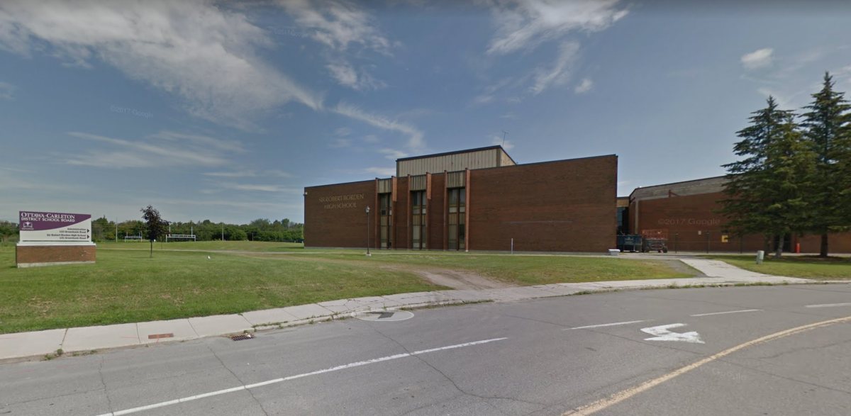 Police officers were called to Sir Robert Borden High School in Ottawa's Nepean neighbourhood on Thursday afternoon after a message threatening a staff member was phoned into the school.