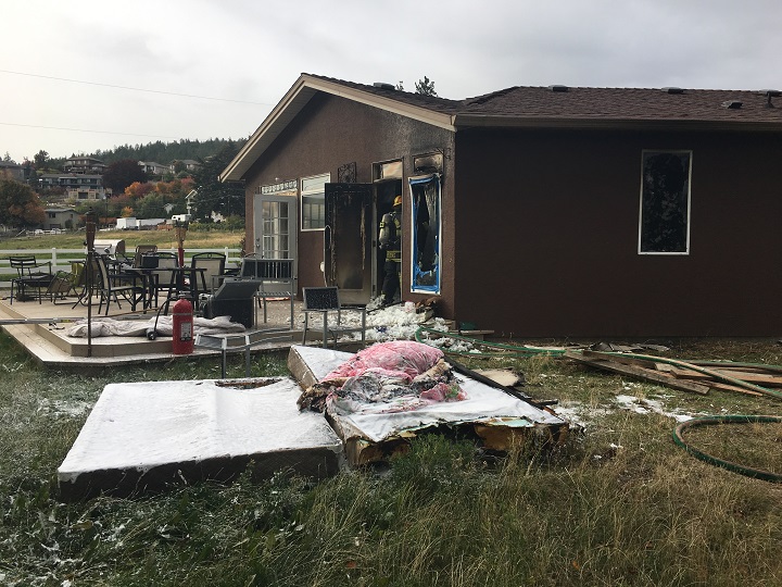 Emergency crews say the fire was contained to the back bedroom.