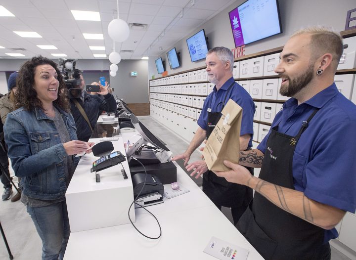 Alicia Wright makes a purchase at the Nova Scotia Liquor Corporation cannabis store in Halifax on Oct. 17, 2018.