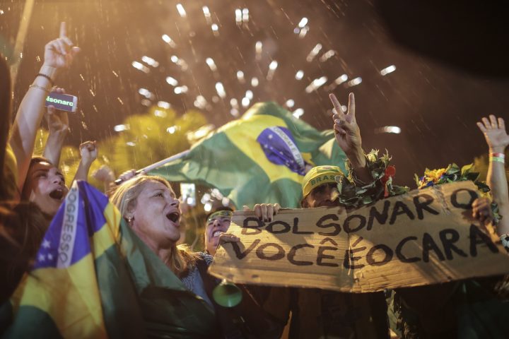 Supporters of Brazilian far-right presidential candidate Jair Bolsonaro celebrate his victory in Rio de Janeiro, Brazil, 28 October 2018.