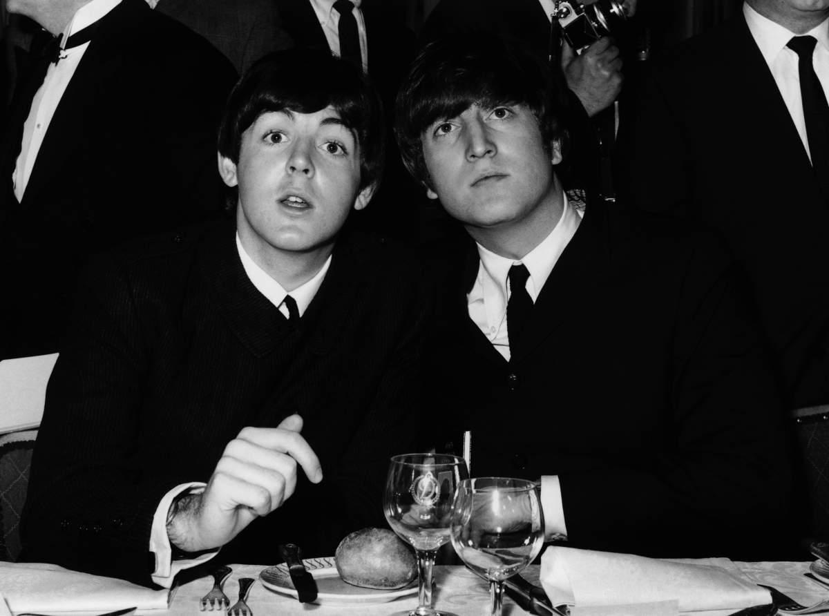 Paul McCartney (left) and John Lennon at the Variety Club Showbusiness Awards held at the Dorchester in London, England. Sept. 13, 1964.