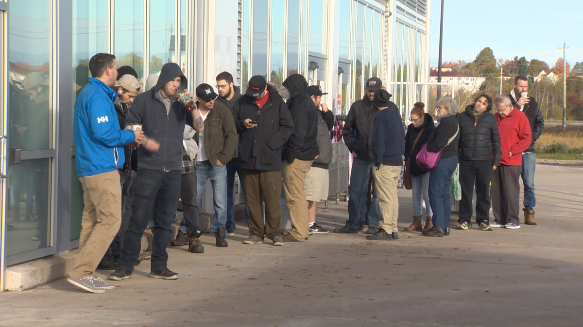 A line of customers was formed waiting for doors to open Thursday