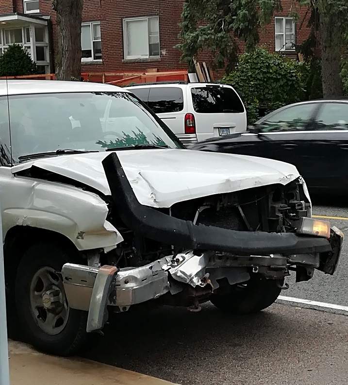 A Global News cameraman spotted a damaged white pickup truck near Armadale Avenue and South Kingsway an hour and a half after the crash.