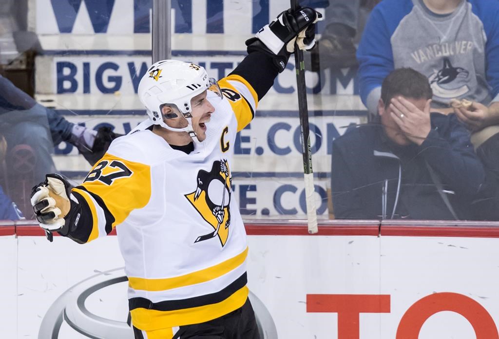 Pittsburgh Penguins’ Sidney Crosby celebrates his goal against the Vancouver Canucks during the second period of an NHL hockey game in Vancouver, on Saturday October 27, 2018. THE CANADIAN PRESS/Darryl Dyck