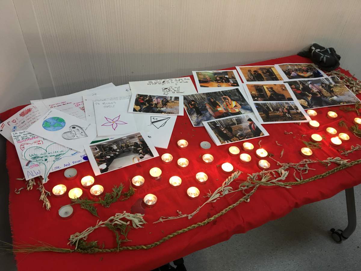 Pictures and drawings were laid out as friends and neighbours of the fire victims gathered in support of the family.