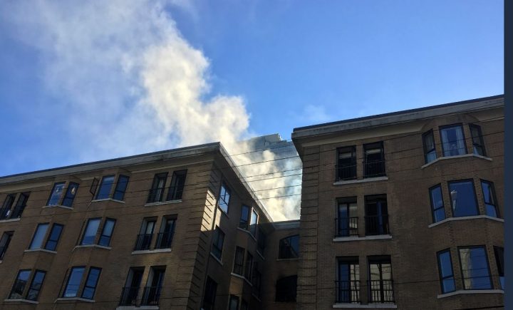 The four-alarm blaze broke out in the Washington Court building in the 900-block of Thurlow Street at 9 a.m. 