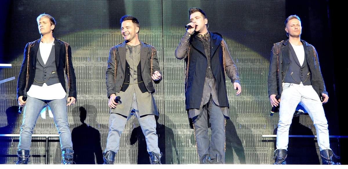 (L-R) Kian Egan, Shane Filan, Mark Feehily and Nicky Byrne of Westlife perform at MEN Arena as part of their farewell tour on May 26, 2012, in Manchester, England.