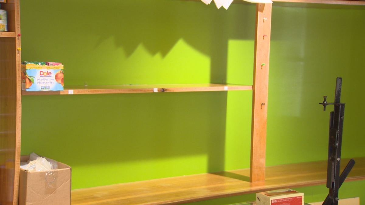 While some shelves in Isthmus Monctno’s food packing space are full, others remain empty